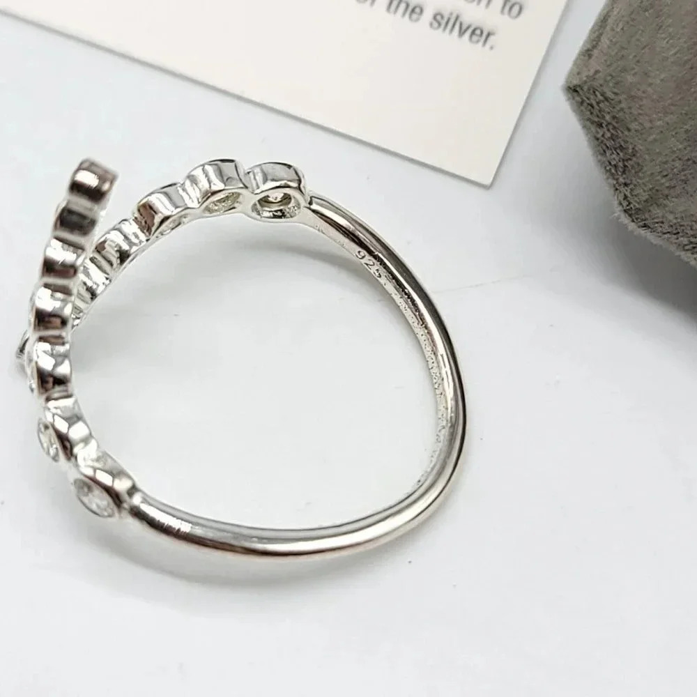 AVON Sterling Silver Graduated CZ Bypass Ring Embellished with CZ Size 7 NIB - Picture 5 of 5